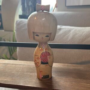Vintage Wooden Kokeshi Doll with Pink and Black Details